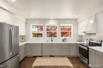 This bright and stylish BRAND NEW kitchen is perfect for gathering.