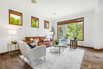 Elegant yet cozy space bathed in natural light—perfect for entertaining or quiet moments.