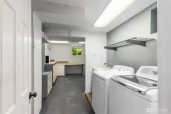 Basement utility room with laundry