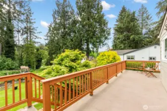 Stairs leading into fenced portion of the backyard.