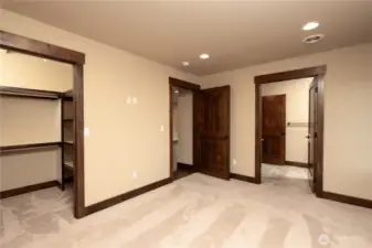 ADU M bedroom with walk-in closet toward M bath