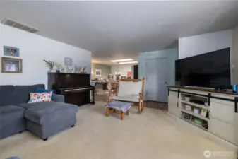 Unit A, front room looking toward dining room