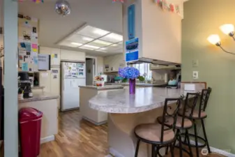 Eat-in kitchen in Unit A, with plenty of counterspace and a center island.