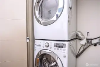 Washer dryer area is hidden in closet