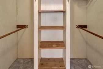 Walk-in closet with built-ins.