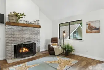 Upstairs living room #1 with wood burning fireplace (another one in the adjacent 2nd living room)
