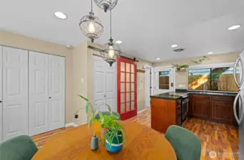 Coat closet and utility closet of off dining area.