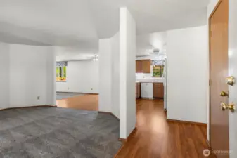 The formal living area is to the left as you enter - kitchen and family room are ahead
