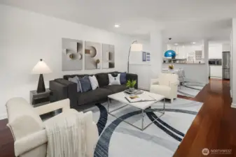 Contemporary Great Room with gorgeous cherry hardwood floor, Dining Room, Powder Bathroom and open Kitchen.