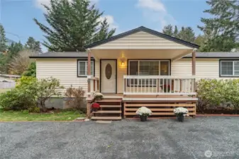 Covered front porch is a nice place to relax or entertain.