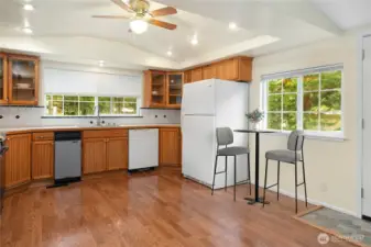 Lots of counter space and room for a table or island in the kitchen. Refrigerator and compactor are newer.