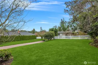 Great topography, great neighborhood & fabulous upside potential for a savvy investor/builder!!!