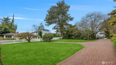 As you come up the private drive you bear left into the "driveway" to this lot.