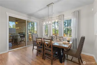 Dining room with large slider to covered deck