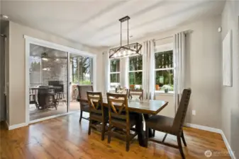 Dining room with large slider to covered deck