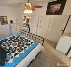 Ceiling fan in the primary bedroom. Large closets.
