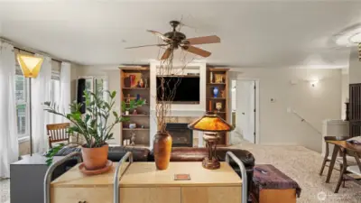 Another angle of the living room highlights its generous proportions and light-filled atmosphere.