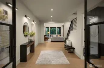 Commanding entryway with double iron and glass doors