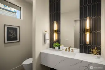 Designer powder room with floating quartz counter
