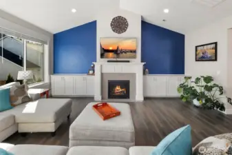Centered on the fireplace, this view shows off the clean lines and built-ins that make the space feel balanced and put together.