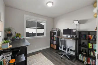 Flexible room set up as a home office, with great natural light and space for working or studying from home.