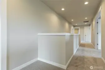 Hallway to bonus room, guest bedroom and primary suite