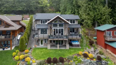 Beautiful view of this stunning come. The landscaping was meticulously chosen by the owners