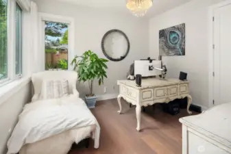 Main floor Den or 4th bedroom with a closet and adjacent 3/4 bathroom