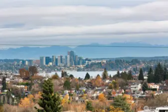 To the east a close up of the City of Bellevue with the Cascades in the background.