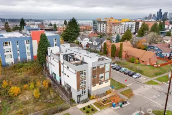Looking to the west, Port of Seattle and Elliott Bay in the background.  Live close to Beacon Avenue and enjoy great transportation - light rail, frequent bus service, easy commuter routes - and fun shops, services and restaurants.  Not to mention a wonderful public library!