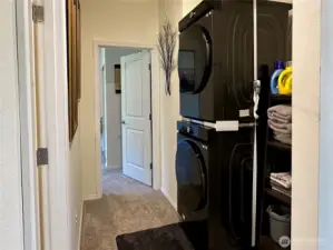 Hallway with laundry.