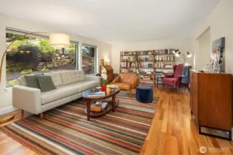 Wall of windows allows the room to be filled with soft natural light.