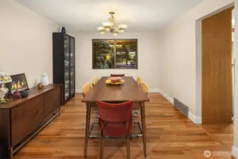Formal dining area facing your backyard and direct access to kitchen and deck