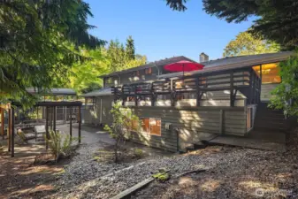 Backyard offers multiple options: deck off the kitchen, covered seating area gazebo and RV / Boat covered parking area at the back.