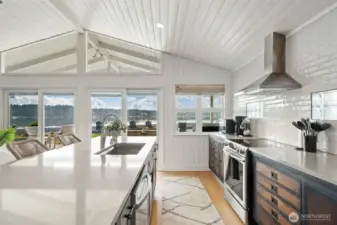 Custom color cabinetry adds a beautiful accent.