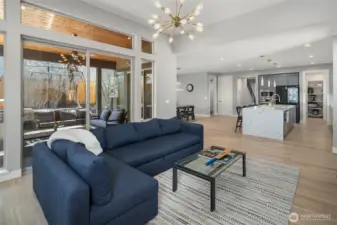 Open floor plan, walls of windows and soaring ceilings.