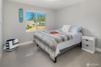 One of 3 spacious bedrooms: all with Custom walk-in closets