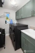 Laundry Room with dual Samsung Bespoke Washer/Dryer Combo