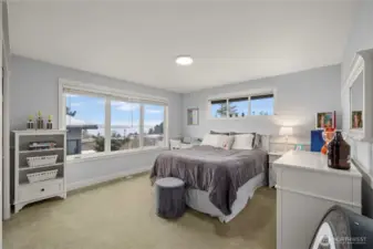 Upstairs bedroom with views of Lake Washington and the Olympic Mountains.