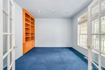 To the right of the foyer is the living room/first floor office.
