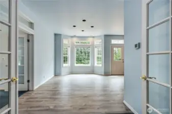 Coming out of the dining room into the eat-in kitchen area.