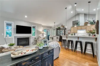 Light and bright great room style living with fresh paint and lighting.