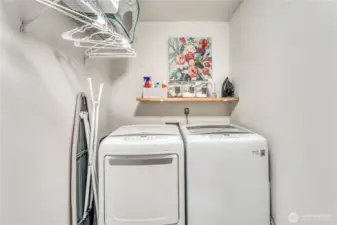 Laundry room with extra hanging space.