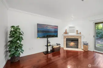 Sliding glass door leads to private back patio with storage closet.