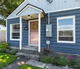 Fresh exterior paint and welcoming front porch