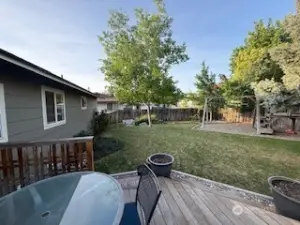 cozy backyard with great shade and entertaining space