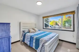 Upstairs bdrm #2 - the blinds you open to view the magical backyard.