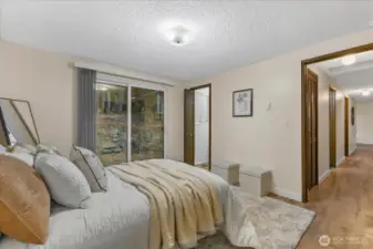 Primary bedroom with attached bathroom