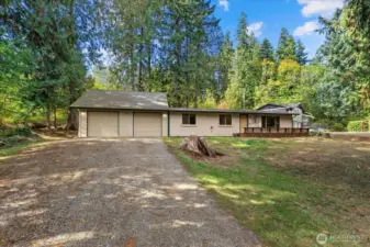 Long driveway with plenty of room for all of your toys and even an RV.