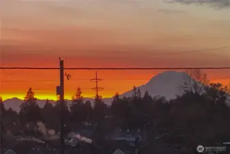 Great views of Mountain Rainier. . Sit back and enjoy morning coffee while watching the sunrise on clear mornings     from living room and upstairs bedrooms on clear day